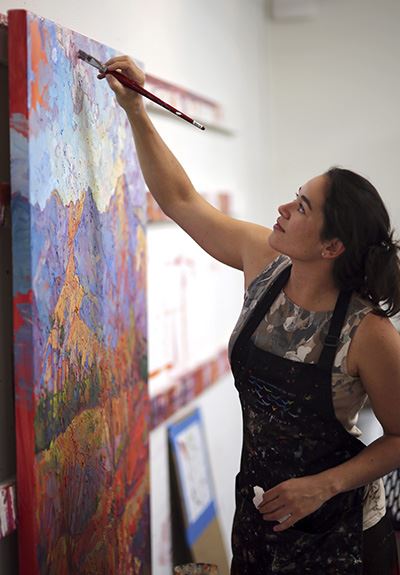 Erin Hanson painting a painting