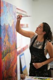 Erin Hanson painting in her Frogtown studio