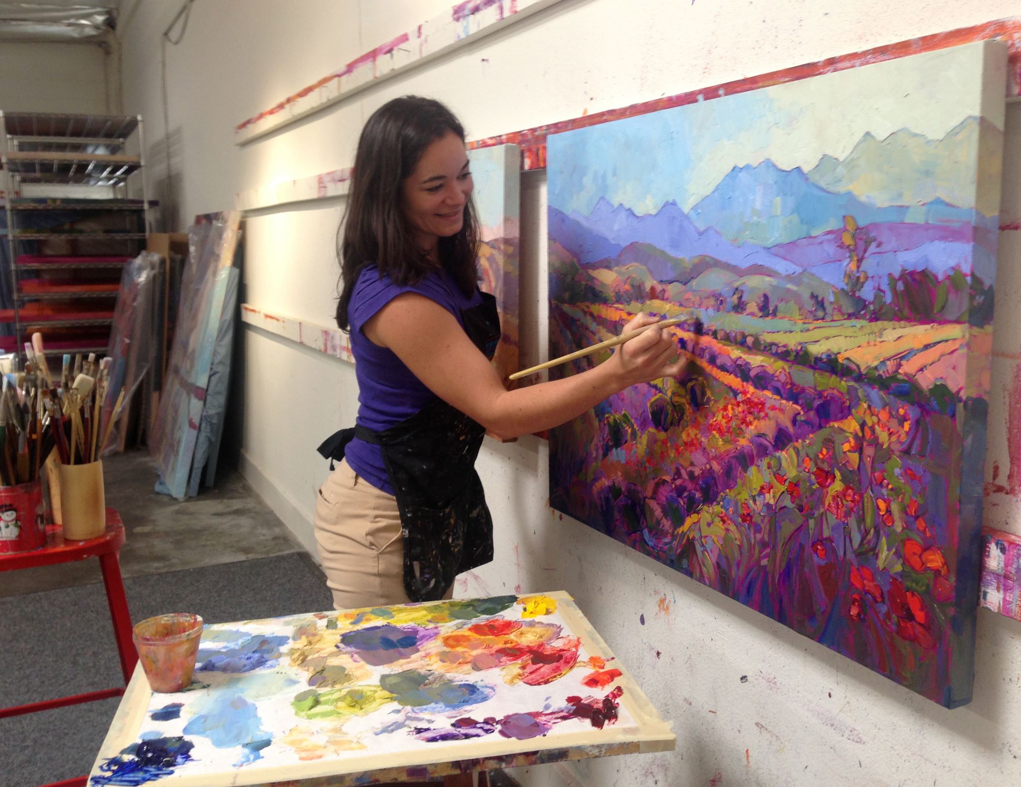 Erin Hanson painting a vineyard masterpiece