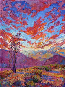 Vivid color and loose brush strokes capture the beauty of a setting sun across the layered mountains of Borrego Springs, California. The tall, graceful ocotillo stands boldly in the foreground, its long limbs blooming with heavy red flowers. The desert in bloom is one of the most beautiful sights in California.