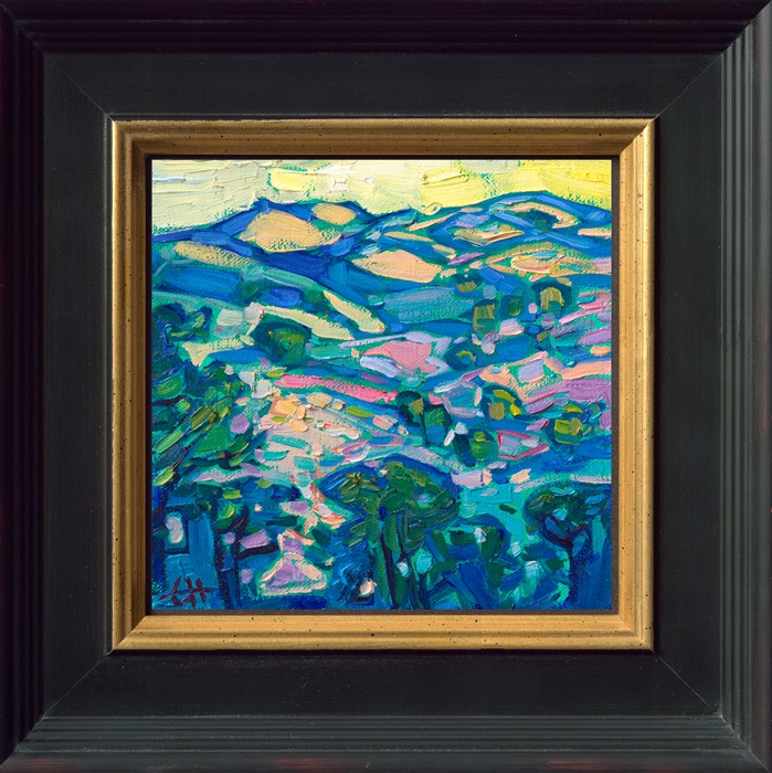This miniature painting captures the rolling hills of Paso Robles, California. The warm light of dawn casts long turquoise shadows across the layers of hills and oak trees.</p><p>"Shadowed Hills" is an original oil painting on linen board. The piece arrives framed in a mock floater frame in black and gold.
